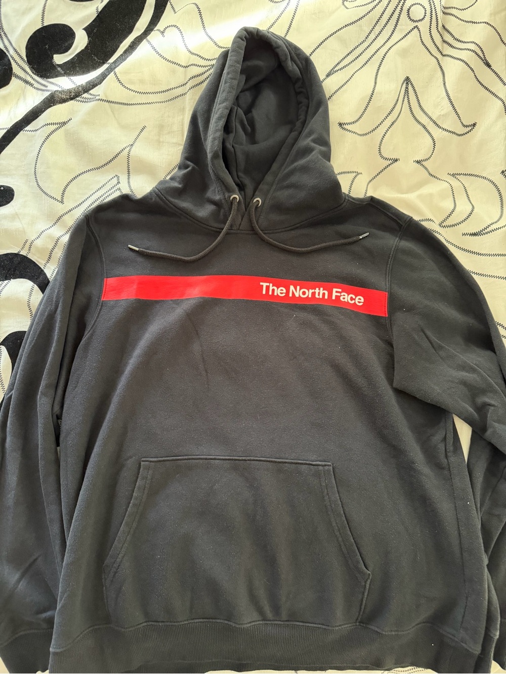 The North Face Black Pullover Hoodie with Red Chest Stripe